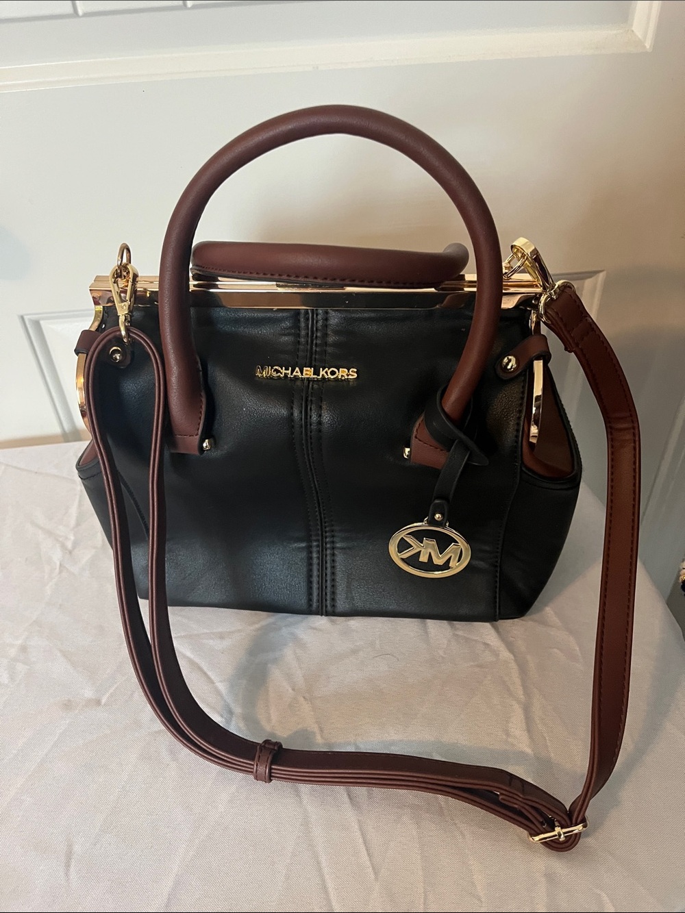 Michael Kors Black & Brown Leather Satchel with Gold Hardware